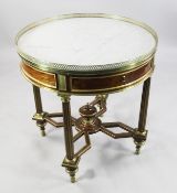 A Louis XVI style brass mounted mahogany bouillotte table, in the manner Adam Weisweiler, the