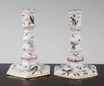 A pair of Meissen bird painted candlesticks, Marcolini period c.1800, of hexagonal form with multi-