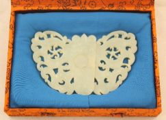 A Chinese pale celadon jade `butterfly` two piece belt buckle, 18th / 19th century, the two halves