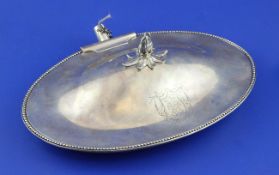 A George III silver oval chafing dish by Henry Greenway, lacking handle, with engraved armorials,