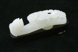 A Chinese white jade `dragon` belt hook, 18th/19th century, carved with an openwork chi-dragon
