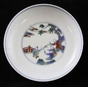 A Chinese doucai `boys` saucer dish, Chenghua mark, 18th century, the central medallion painted with