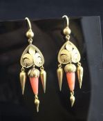 A pair of late Victorian gold and coral set drop earrings, with pierced foliate mounts, 2in.