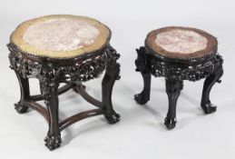 Two Chinese rouge marble topped rosewood stands, late 19th century, the octafoil shaped tops above