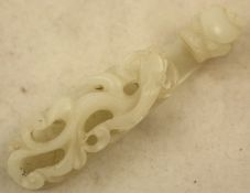 A Chinese white jade `dragon` belt hook, 18th / 19th century, carved with an openwork chi-dragon and
