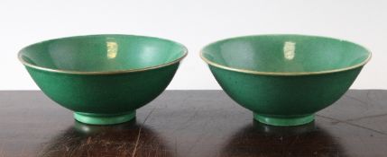 A pair of Chinese green crackle glazed bowls, Kangxi period, each with brown edged rims, on a