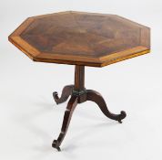 A 19th century walnut and satinwood crossbanded octagonal tripod table, with segmented veneered top,