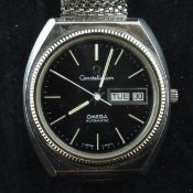 A gentleman`s 1970`s stainless steel Omega Constellation automatic wrist watch, the black dial