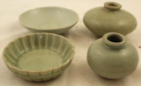 A group of Chinese Longquan celadon wares, Song / Yuan dynasty, comprising a chrysanthemum fluted