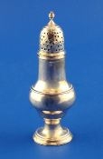 A George III silver pepperette, of baluster form, Thomas Daniell, London, 1778, 5in, 2 oz.