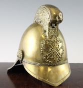 An Edwardian brass Merryweather pattern fireman`s helmet, the front plate with crossed axes and