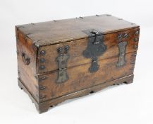 A 19th century Chinese iron bound trunk, with hinged drop down front, on bracket feet, W.3ft 2in.