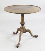 A George III tripod tea table, with circular dished top, on tapering column and downswept