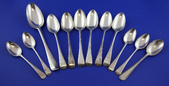 A George II Scottish silver Hanovarian pattern tablespoon, Edinburgh, 1753/54, 8.25in, together with