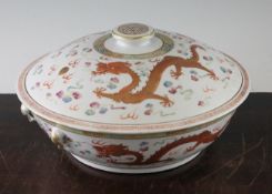 A Chinese famille rose `dragon and phoenix` soup bowl and cover, early 20th century, painted to