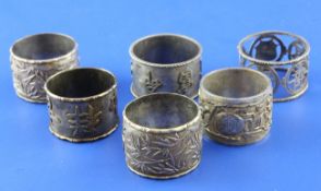 A pair of late 19th/early 20th century Chinese silver napkin rings by Wang Hing and four other
