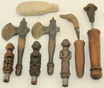 A group of Indonesian betel nut crushers, handles and three axes, Indonesian 19th / early 20th