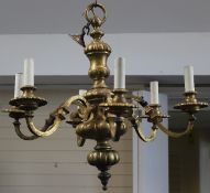 A pair of early 20th century Dutch style six branch chandeliers, with gadrooned decoration, scroll