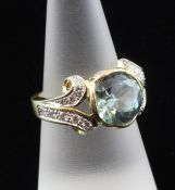 An 18ct gold, blue zircon and diamond set dress ring, with 5.03ct blue zircon and diamond set