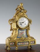 A 19t century French ormolu and Sevres style mantel clock, the enamelled Roman dial signed Lenoir