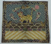 A Chinese embroidered silk and metal thread `leopard` military official third rank badge, c.1910,