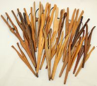 A collection of boxwood and other treen glove stretchers, including examples by Gant Perrin, Dent