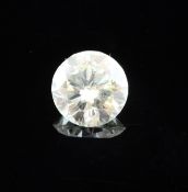 An unmounted round brilliant cut diamond weighing approximately 3.27ct.