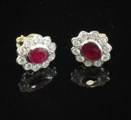 A pair of 18th century gold, ruby and diamond oval cluster ear studs