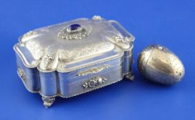 An ornate early 20th century Italian 800 standard silver and lapis lazuli set trinket box, of shaped