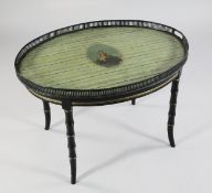 A 19th century oval two handled toleware gallery tray, on a later ebonised and parcel gilt base,