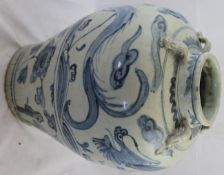 A large Chinese Ming blue and white ovoid jar, Swatow, 16th / 17th century, painted with two chi-