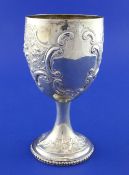 A Victorian silver presentation goblet, embossed with flowers and scrolls, with beaded foot, Charles