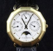 A gentleman`s 18ct gold Baume & Mercier triple calendar moonphase quartz wrist watch, with do-