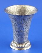 An 18th century Scandinavian silver beaker, with flared rim and embossed with hounds and birds
