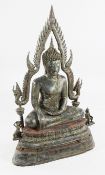 A large 19th century Thai bronze of a seated Buddha, with traces of original paint, 119cm.