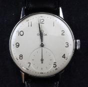 A gentleman`s 1940`s stainless steel Omega manual wind wrist watch, with Arabic dial and