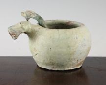 A Chinese green glazed pottery bowl and a similar ladle, Han dynasty, the globular bowl with