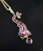 A 1970`s gold, ruby and diamond set dolphin drop pendant, with diamond set eye and bale, on an