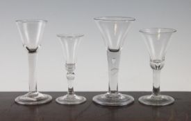 Four Georgian wine glasses, all c.1740, comprising two ale glasses, a semi-cordial and another,