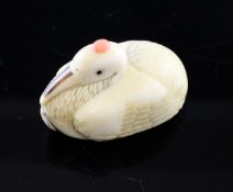 A Chinese ivory `seated crane` snuff bottle, Qing dynasty, with naturalistically carved feathers and