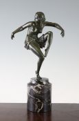 Marcel-André Bouraine. A French Art Deco green patinated bronze figure of a female dancer, signed to