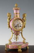 A 19th century French Sevres style ormolu mounted porcelain mantel clock, of urn form, with a