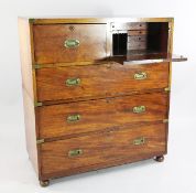 A 19th century mahogany brass bound military chest, the smaller right hand drawer fitted with a