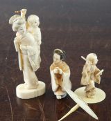 Three Japanese ivory figures, early 20th century, the first of a boy beating a drum his foot