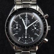 A gentleman`s 1990`s stainless steel Omega Speedmaster automatic wrist watch, the black dial with