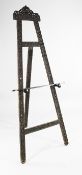 A late 19th century French carved oak A frame easel, with foliate scroll decoration, H.6ft 6in.