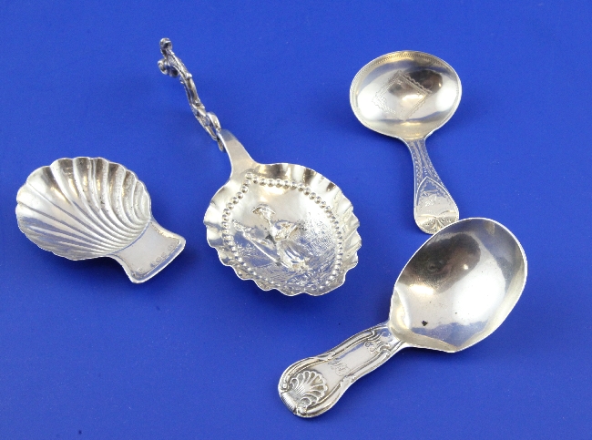 A George III Irish silver hourglass pattern caddy spoon, with engraved monogram, Joshua Buckton?,