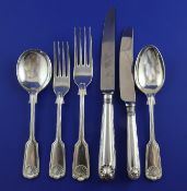 A modern matched part canteen of silver fiddle, thread and shell pattern cutlery, comprising