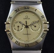 A gentleman`s 1970`s steel and gold Omega Constellation calendar quartz wrist watch, with Roman