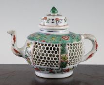 A rare Chinese famille verte double walled teapot, Kangxi period, the compressed globular body